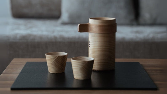 Japanese cedar sake cup set on a wooden table