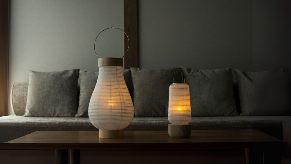 Two Japanese table lamps in dimly lit Japanese style room
