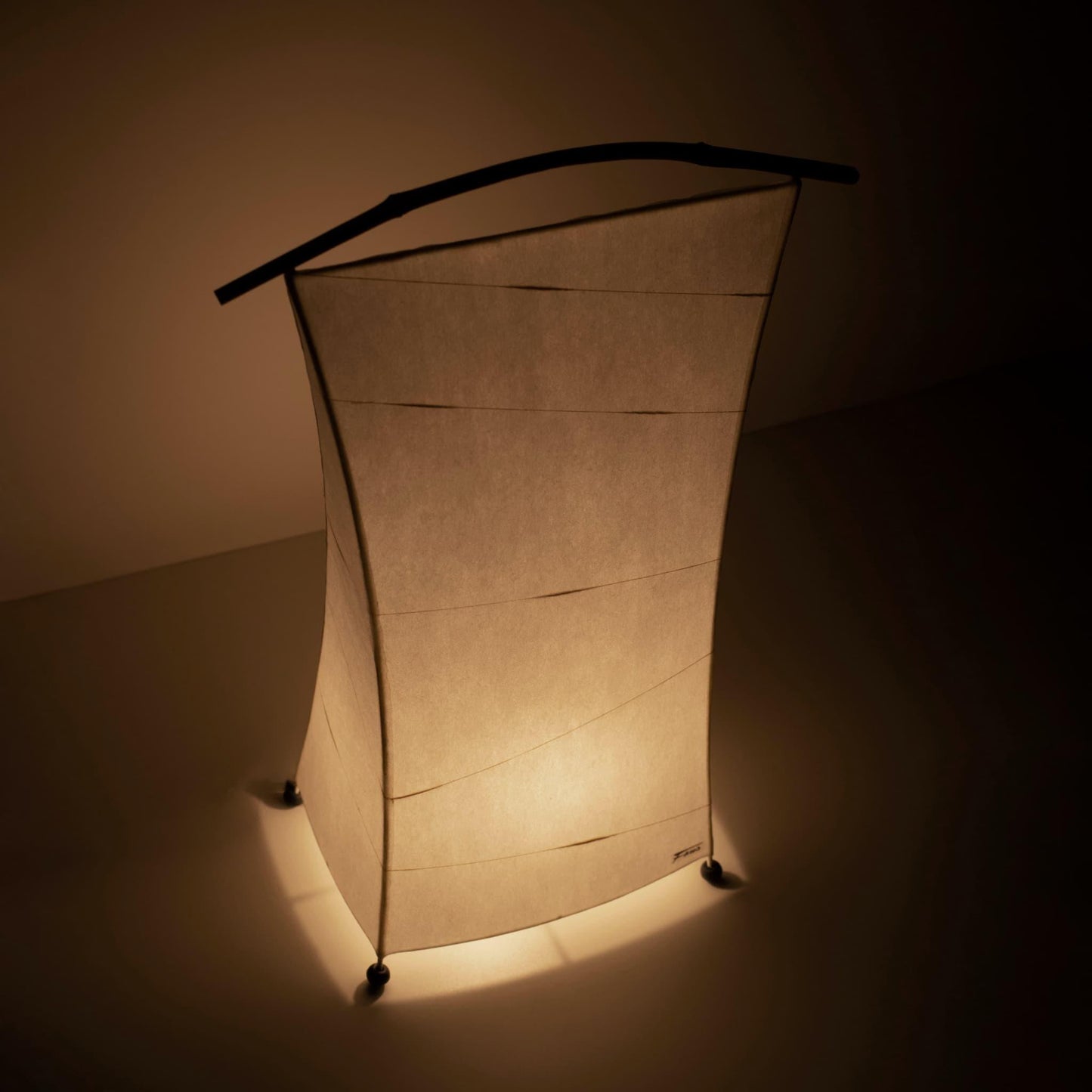 A unique paper floor lamp crafted with Gifu lantern techniques and 1300-year-old Mino washi paper.
