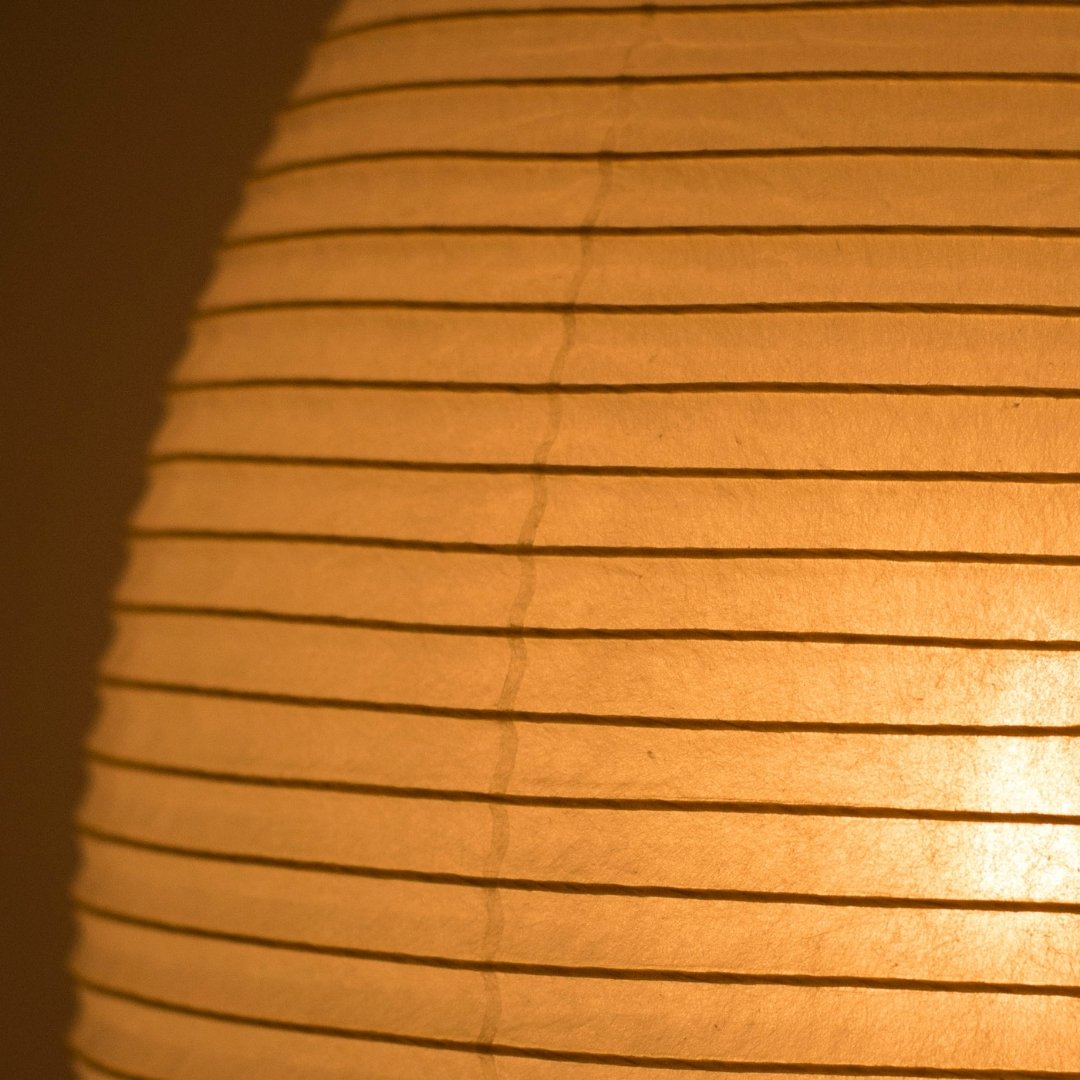 Soft, warm light diffuses through high-quality washi paper in the Japanese paper floor lamp "Chochin lamp 01"