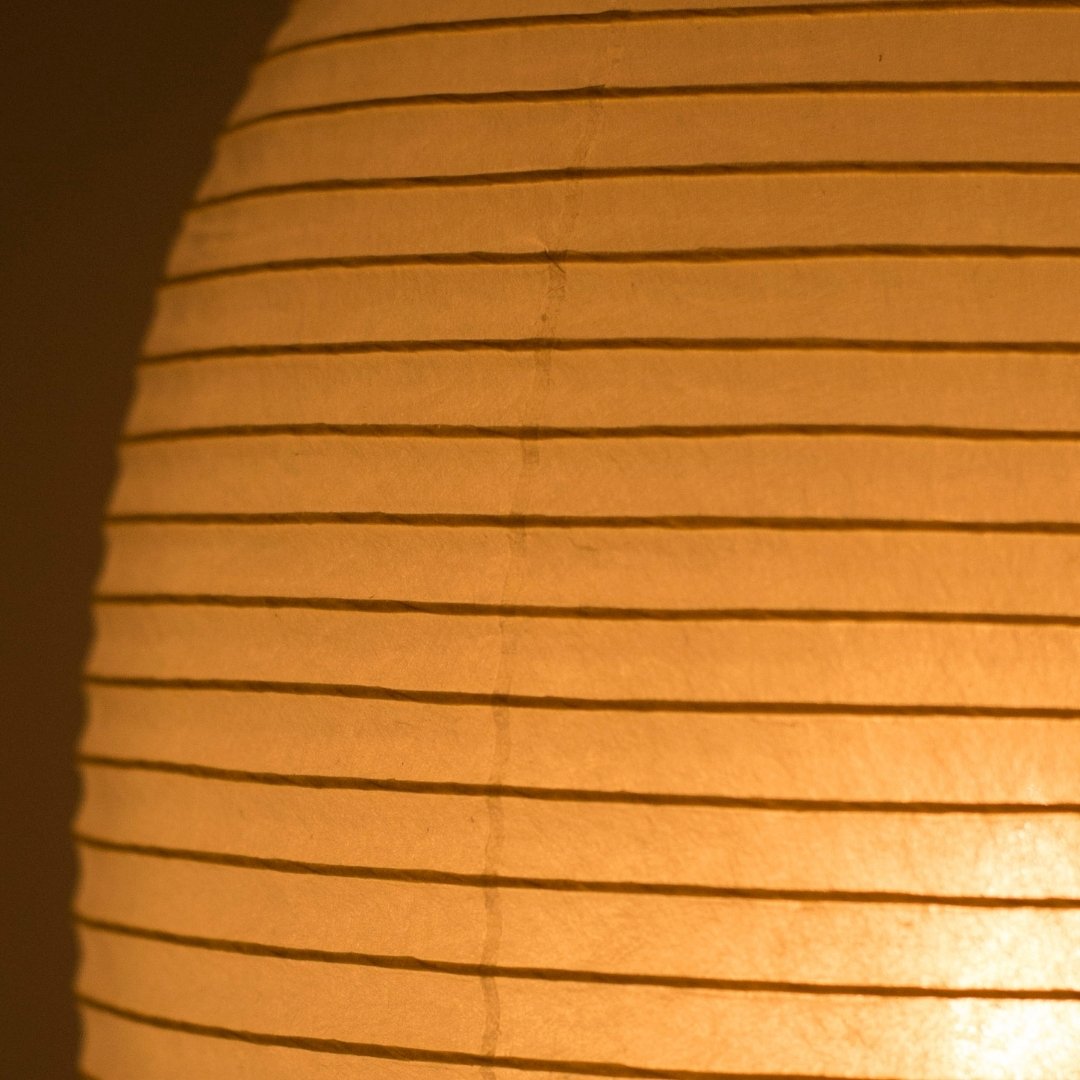 Japanese paper floor lamp "Chochin lamp 02" radiates a warm, ambient glow through premium washi paper