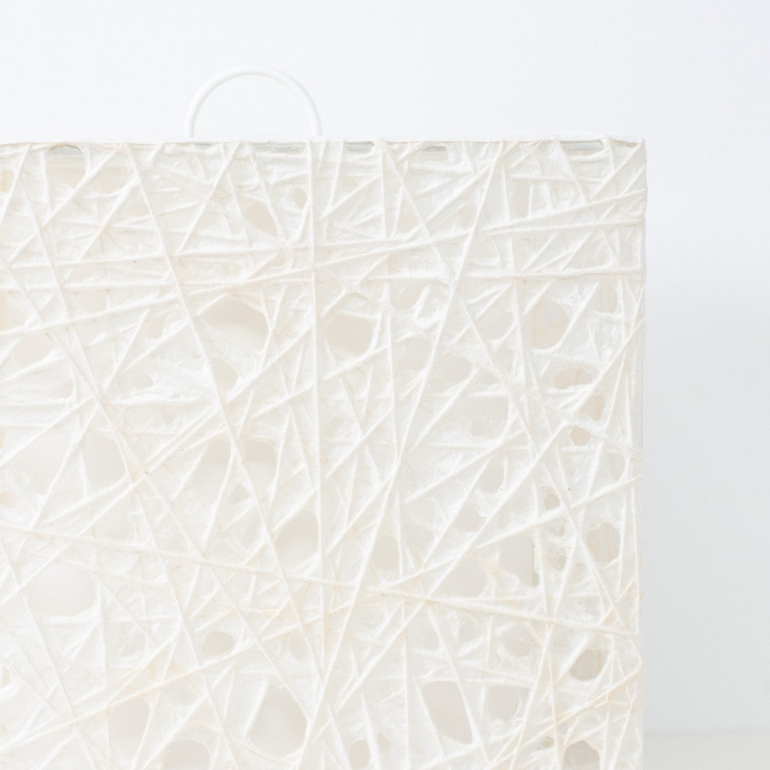 Close-up of white Japanese paper floor lamp ME-LOOK 03, Melook washi web texture detail
