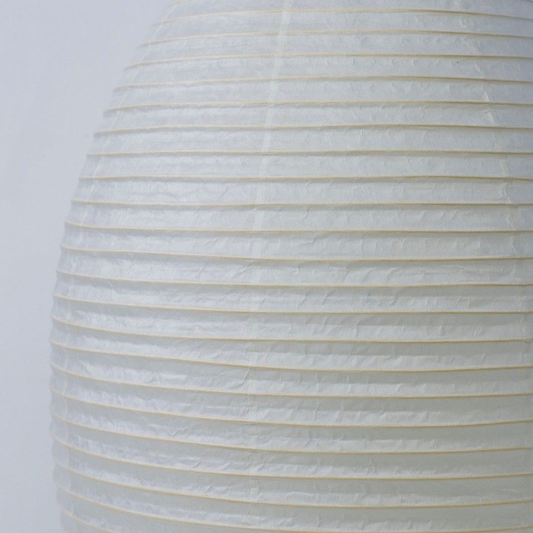 Elegant Japanese paper floor lamp 'paper moon 11' with premium white washi, showcasing its delicate texture