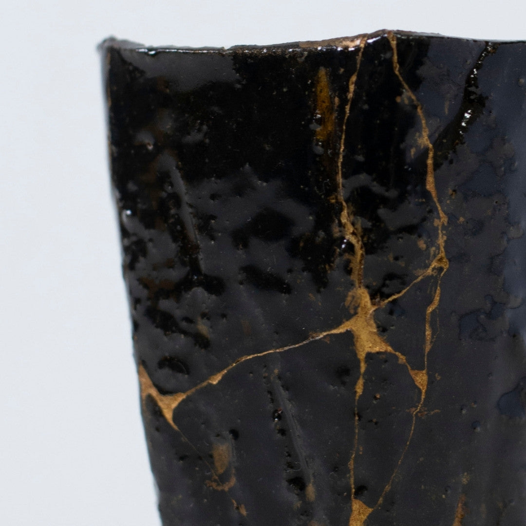 Close-up side view of Pentagon Kintsugi Cup "Tenmoku" Black 03