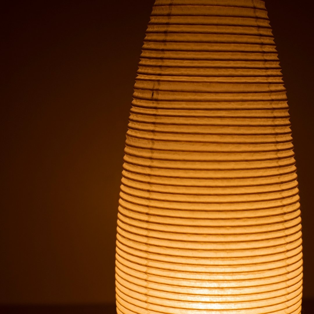 Close-up glowing Japanese paper floor lamp "paper moon 03" – elegant tall Washi Japanese floor lamp