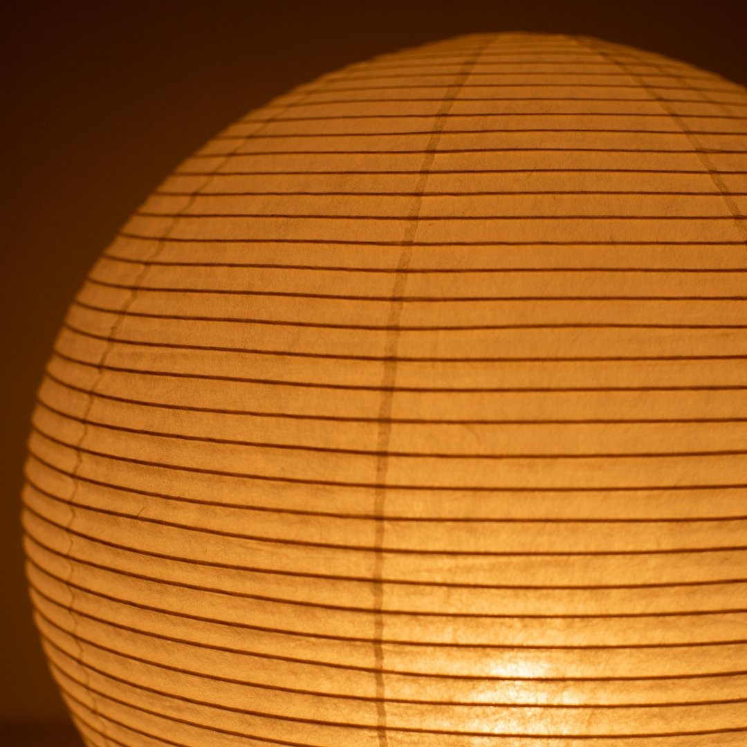 Close-up glowing Japanese paper floor lamp "paper moon 05" – luminous full moon Washi floor lamp