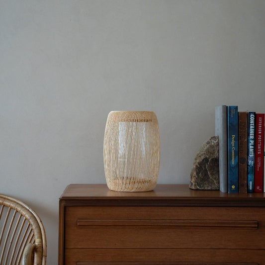 Japanese Bamboo Flower Vase "Cocoon" on a wood shelf in Japandi room -  Ikebana flower vase with wabi-sabi aethetics