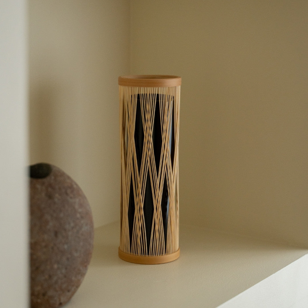 Japanese Bamboo Flower Vase “Entwined Branch” on a white shelf - Stylish ikebana flower vase with wabi-sabi aesthetic