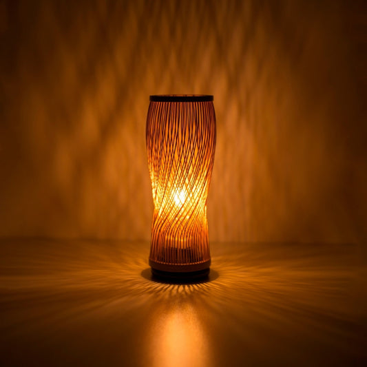 Japanese Bamboo Table Lamp “Single Bloom” illuminating a dark room - Authentic Bamboo Bedside Lamp