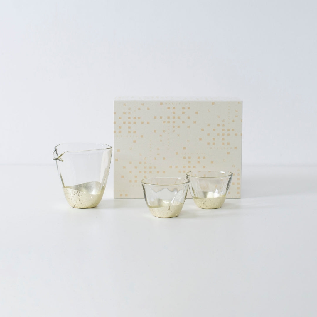 Japanese sake cup set in champagne gold with Kanazawa leaf, includes bottle and two cups by HAKUICHI