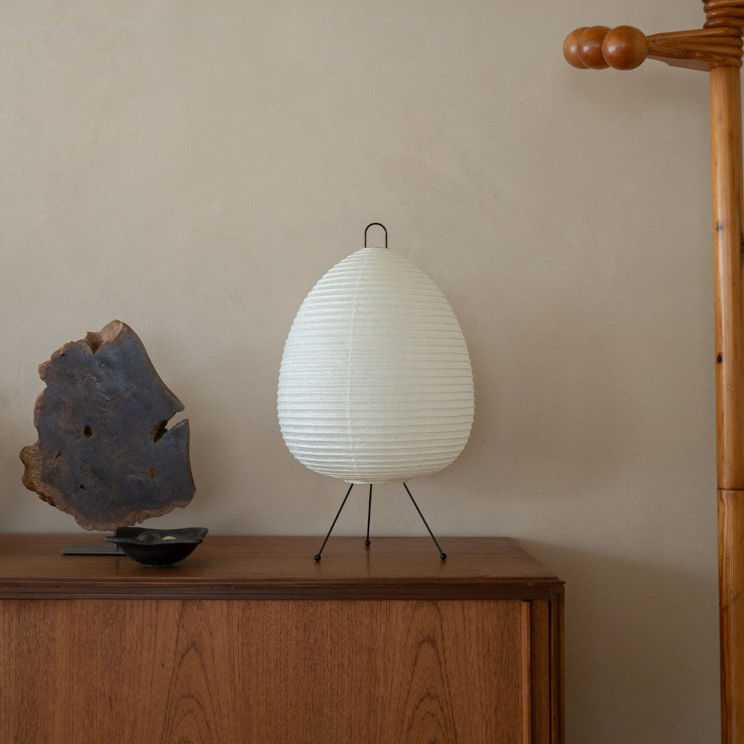 Japanese Paper Floor Lamp "Chochin lamp 01" on a wood shelf in Japandi style living room - Unique paper lantern for Japandi living room