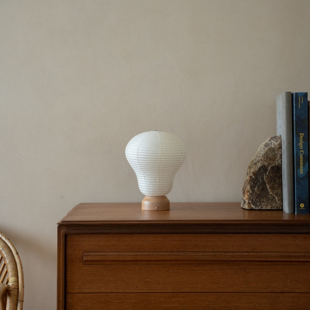 Japanese Paper Table Lamp "Balloon" on wooden shelf in Japandi style room – Unique table lamps for Japandi bedroom & living room