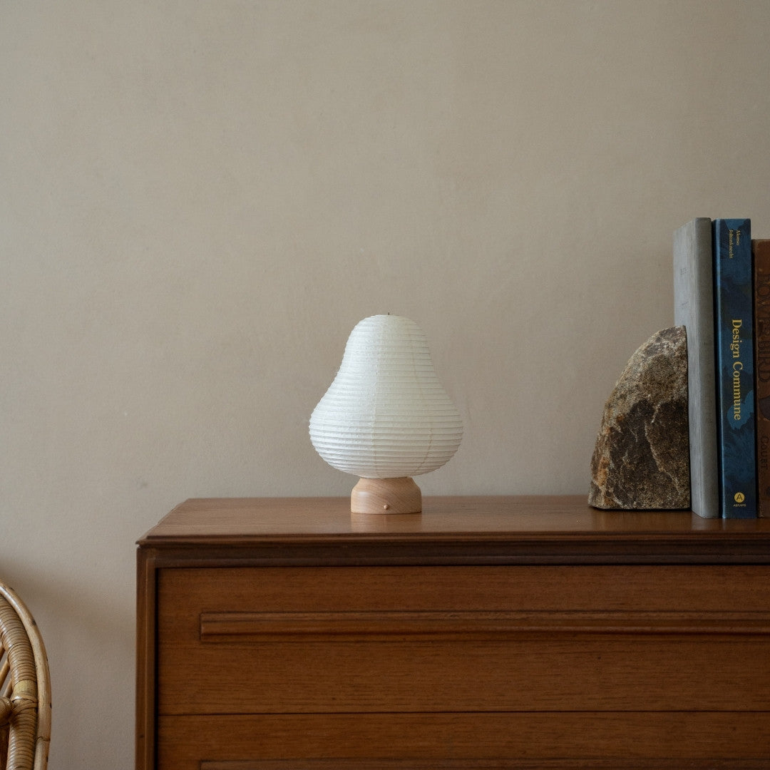 Japanese Paper Table Lamp "Mountain" on wooden shelf in Japandi style room – Stylish Wabi-Sabi lamp for Japandi living room