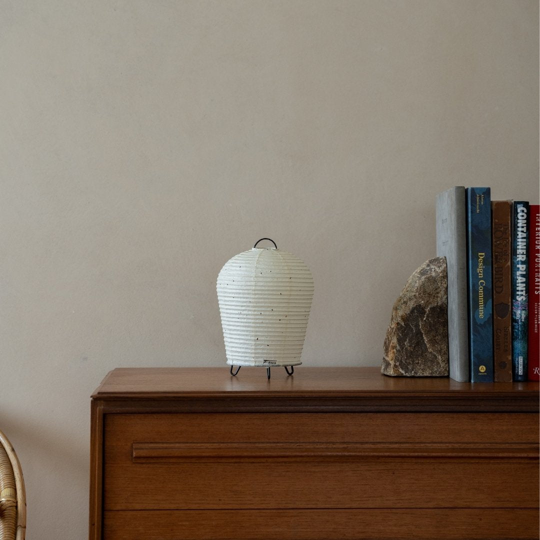 Japanese Paper Table Lamp "PAPERSON 01" on a wood table in Japandi living room - Unique table lamps for living room & bedroom