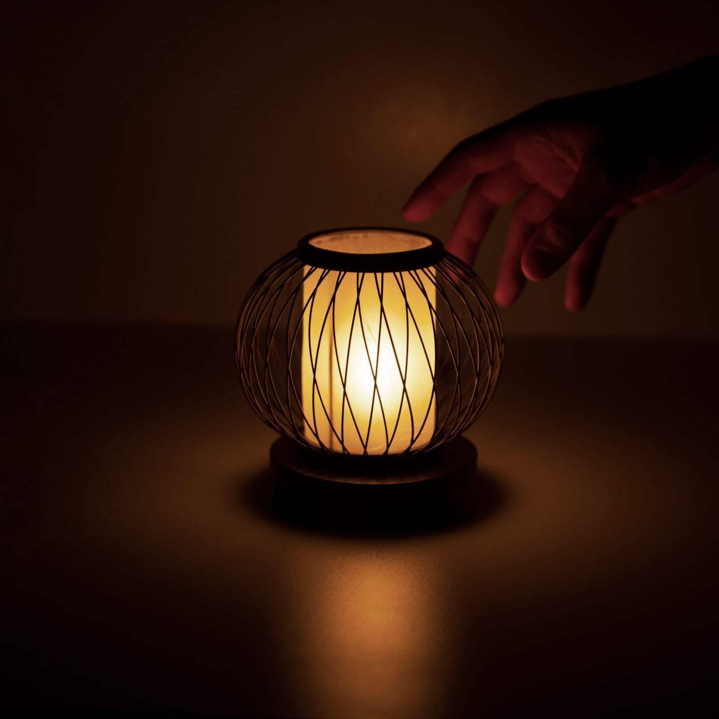 Japanese bamboo table lamp on a table in a Japandi style bedroom, showcasing 800 years of craftsmanship from Shizuoka, Japan.