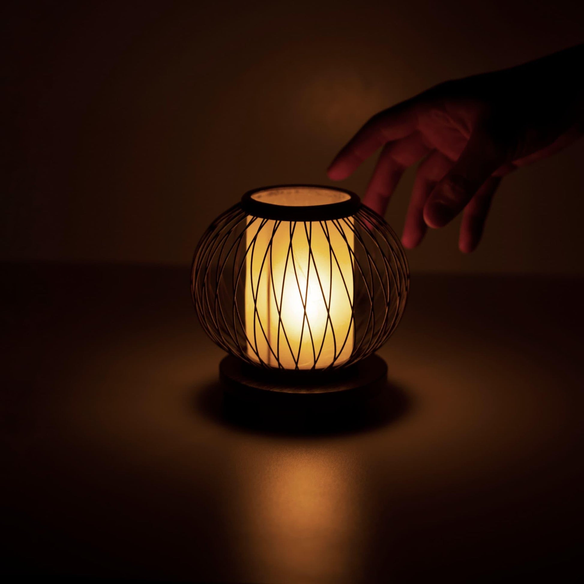 Japanese bamboo table lamp on a table in a Japandi style bedroom, showcasing 800 years of craftsmanship from Shizuoka, Japan.