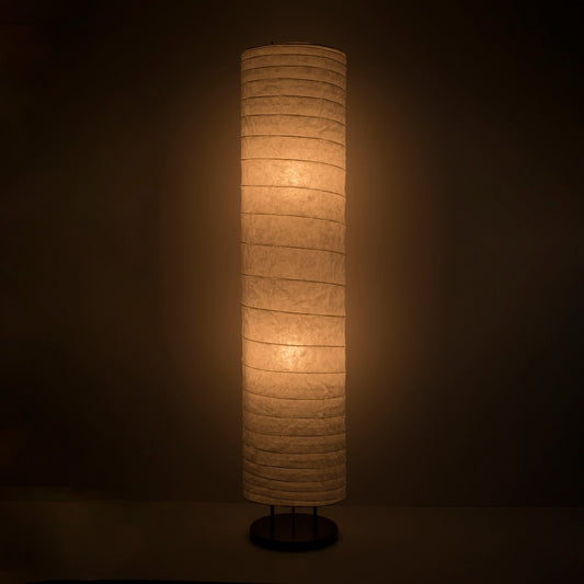 Japanese Washi Paper Floor Lamp "Momi Washi 02" illuminating a dark room – Tall Standing Lamp for Japandi Living Room