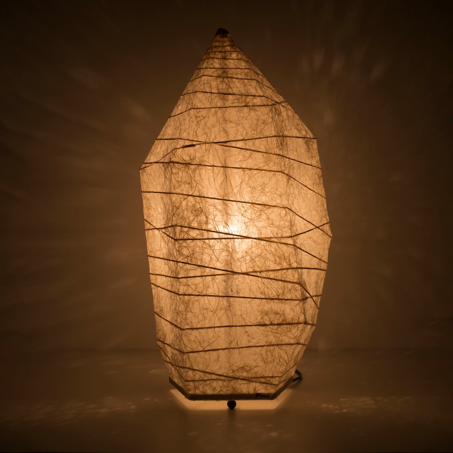 Warm glow Japanese paper floor lamp made with traditional washi paper and ice stone design.