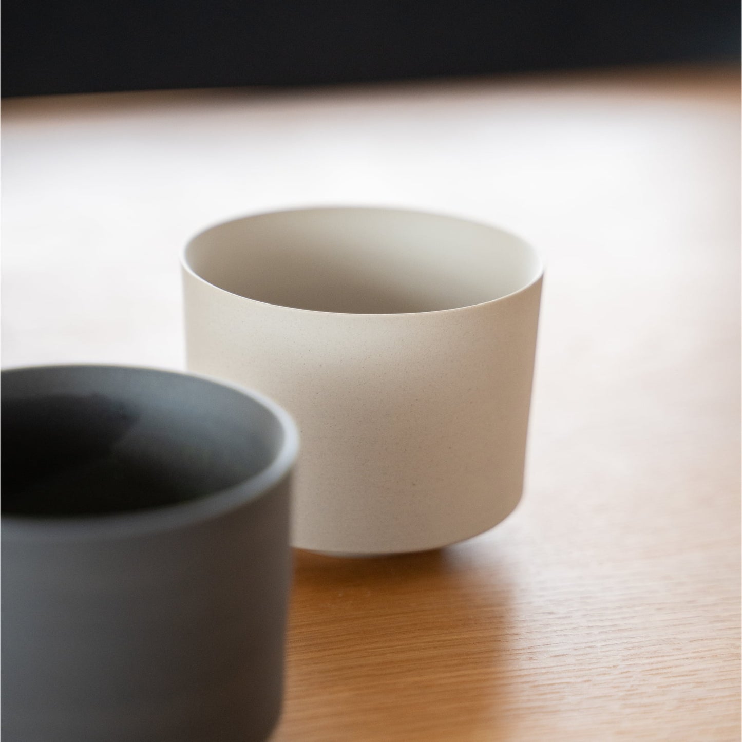 A white matcha bowl on a dining table