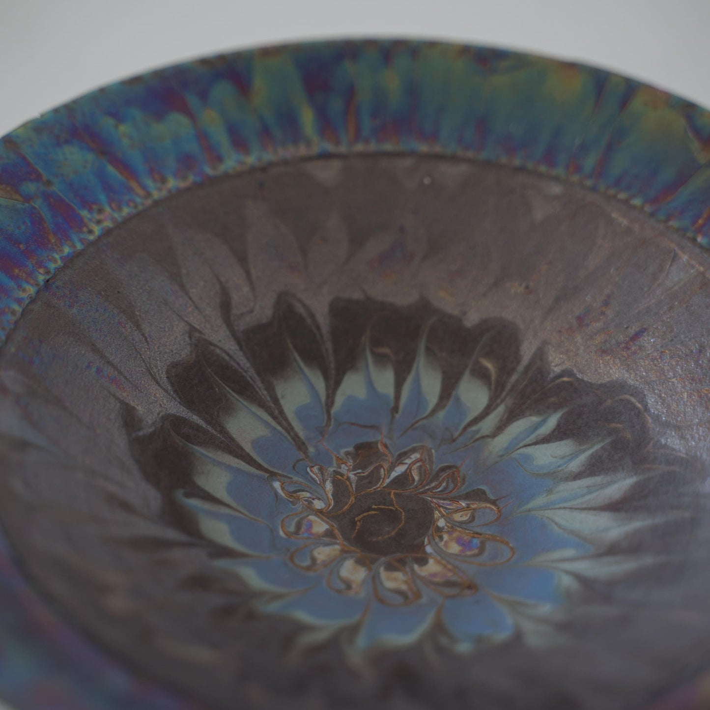 Overhead close up view of Kintsugi Bowl "Supernova" against a white background
