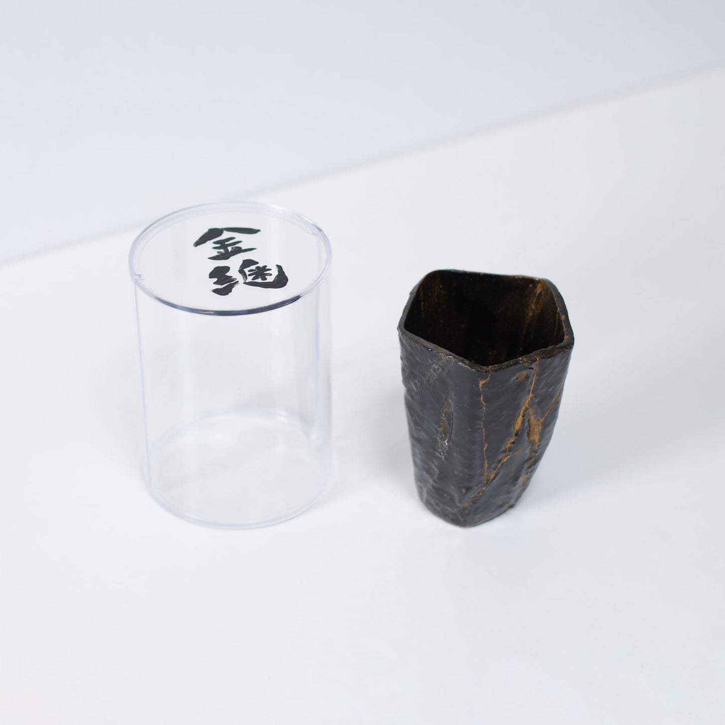Pentagon Kintsugi Cup "Tenmoku" Black 01 with clear case, top view