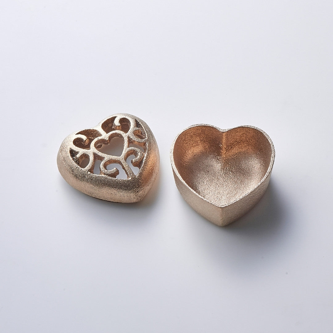 The Japanese Pinless Kenzan 'Heart' crafted with 300-year sand casting for ikebana flower arrangement