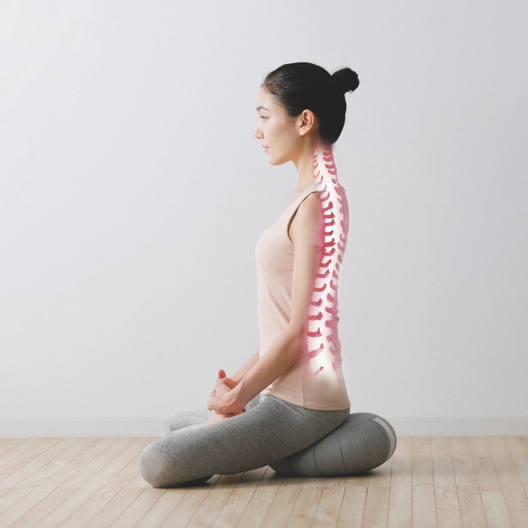 The condition of a woman’s spine while sitting in the lotus position and meditating with a Japanese Meditation Cushion Zafu