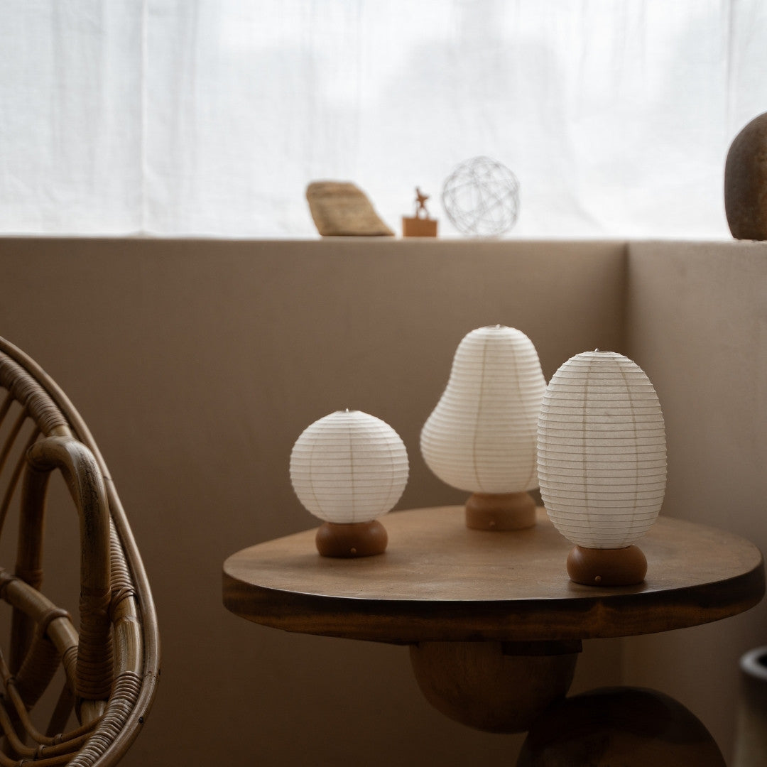 Three Unique Japanese Paper Table Lamps on wooden table in Japandi style room – Unique table lamps for Japandi living room