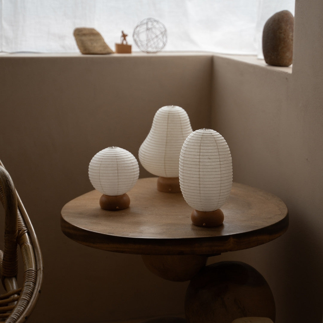 Three Japanese Paper Table Lamps on wooden table in Japandi style room – Wabi-Sabi Portable night lamps for bed room