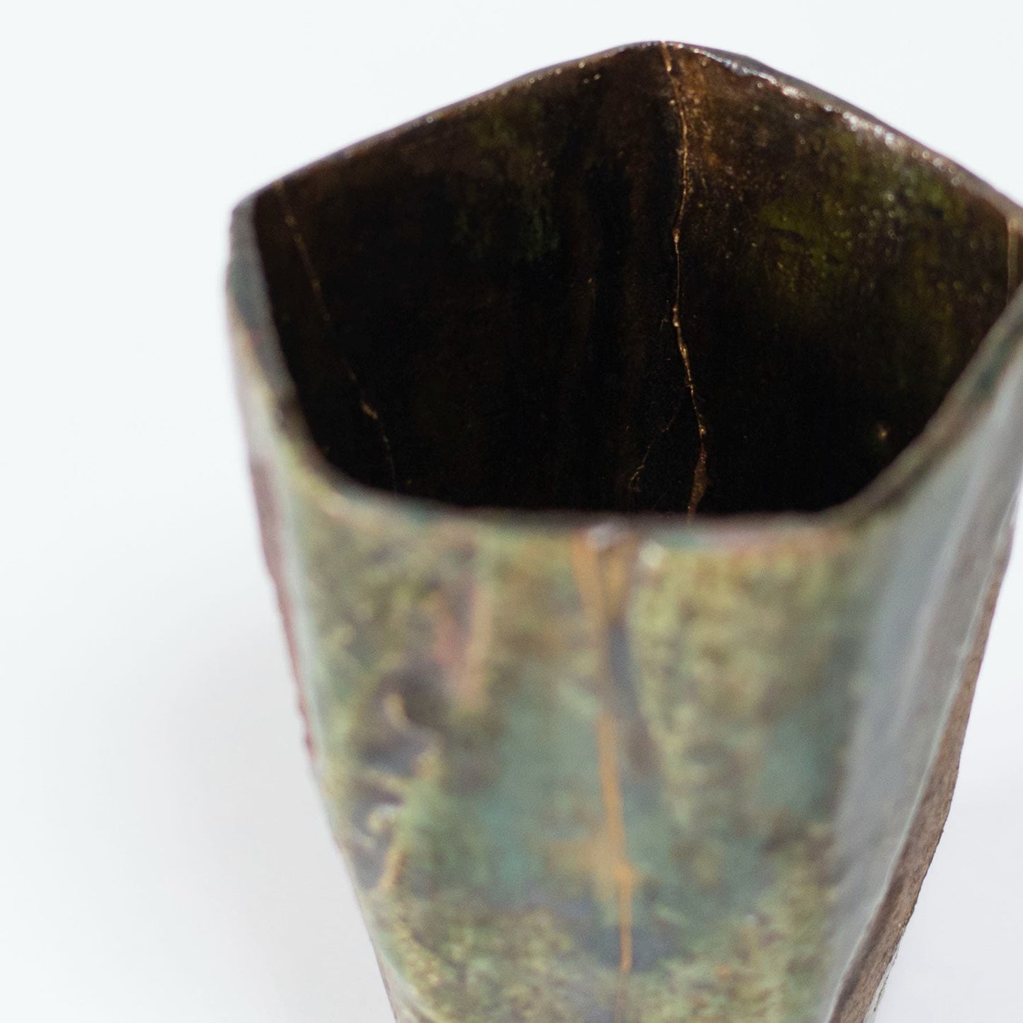 Top view of Pentagon Kintsugi Cup "Oribe" Deep Green 01, showcasing its unique pentagonal shape