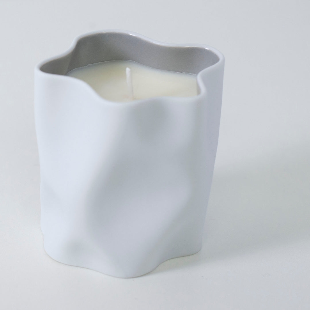 Top view of Japanese candle KARESANSUI with yuzu, peony, and Japanese Incense in Seto porcelain cup