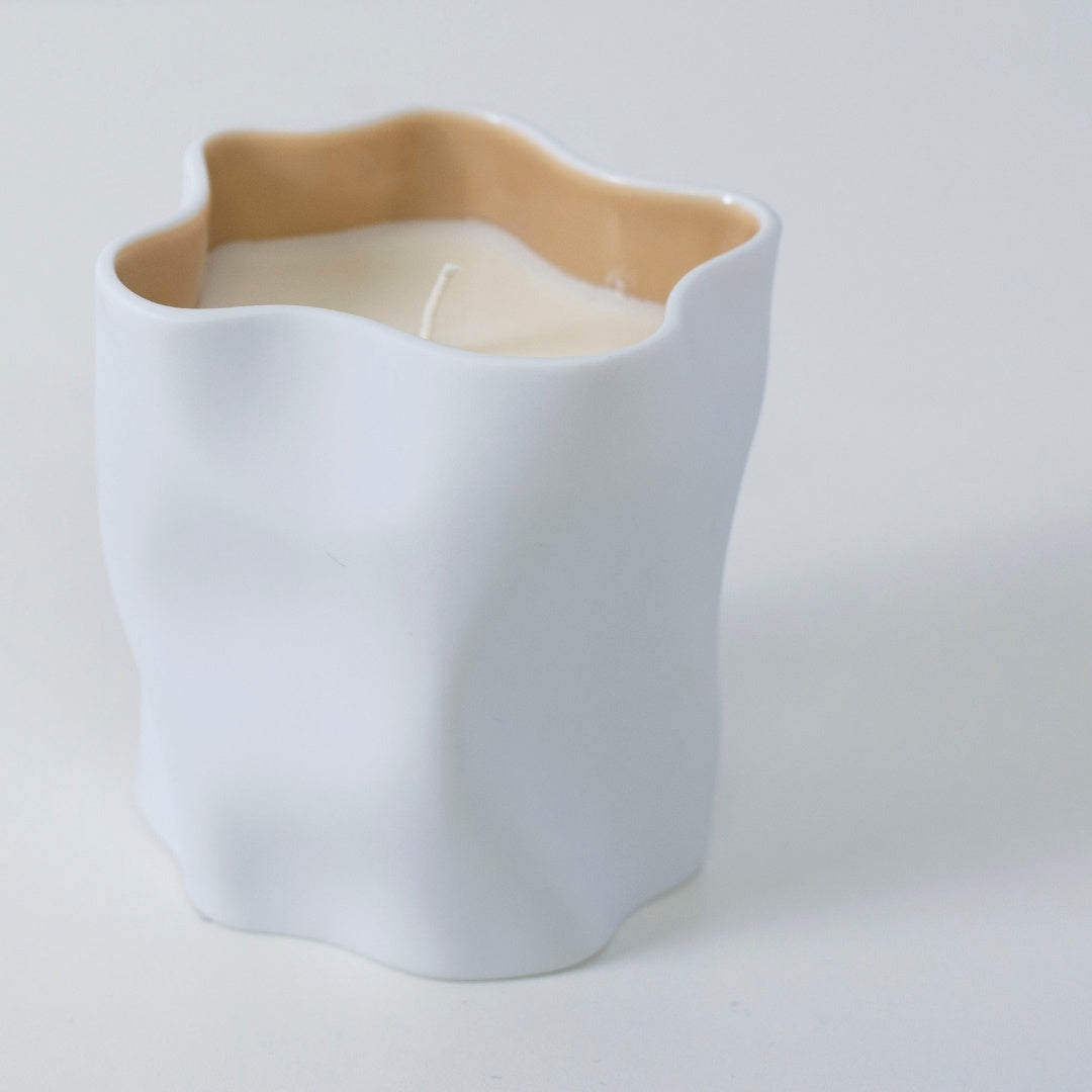 Top view of Japanese candle KITCHIBE with agarwood, herbs, and Japanese Incense in Seto porcelain cup
