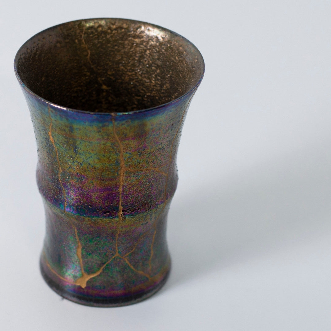 Top view of Rainbow Luster kintsugi cup with iridescent glaze | wabi sabi pottery design
