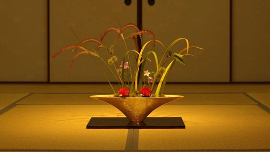 Elegant gold Japanese ikebana vase for flower arranging with kenzan flower frog display