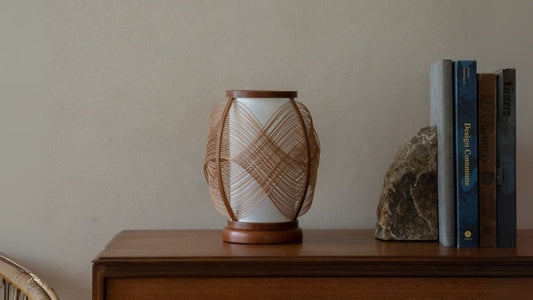 Japanese Bamboo shelf Lamp "Koyou" on a wood table in Japandi living room