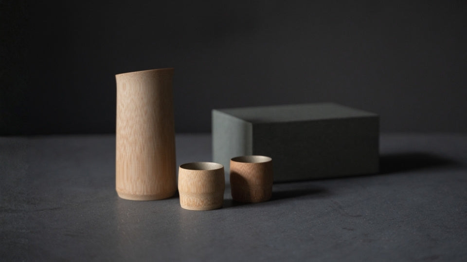 Gift set of Japanese bamboo sake bottle and cups, crafted with traditional techniques from Kyoto, Japan. 