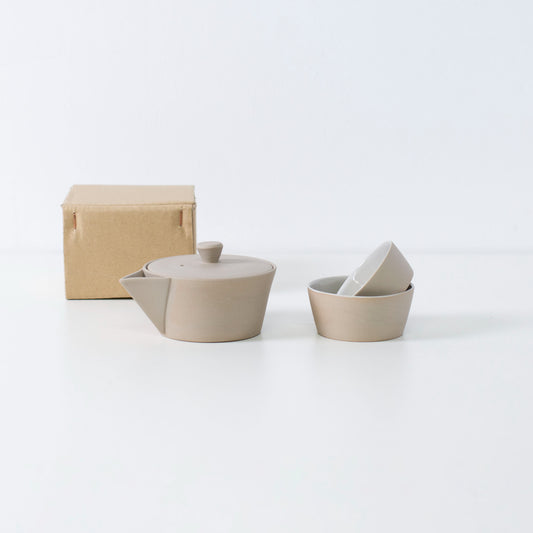 Japanese Banko-yaki nesting tea set with a white teapot and two cups, with a history of several hundred years, presented in a simple paper box.