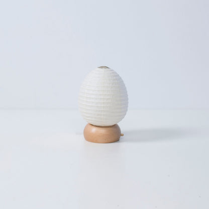 Japanese Paper Table Lamp "Mini Egg" – Egg-shaped portable lamp in delicate Japanese paper, ideal as bedside table lamp