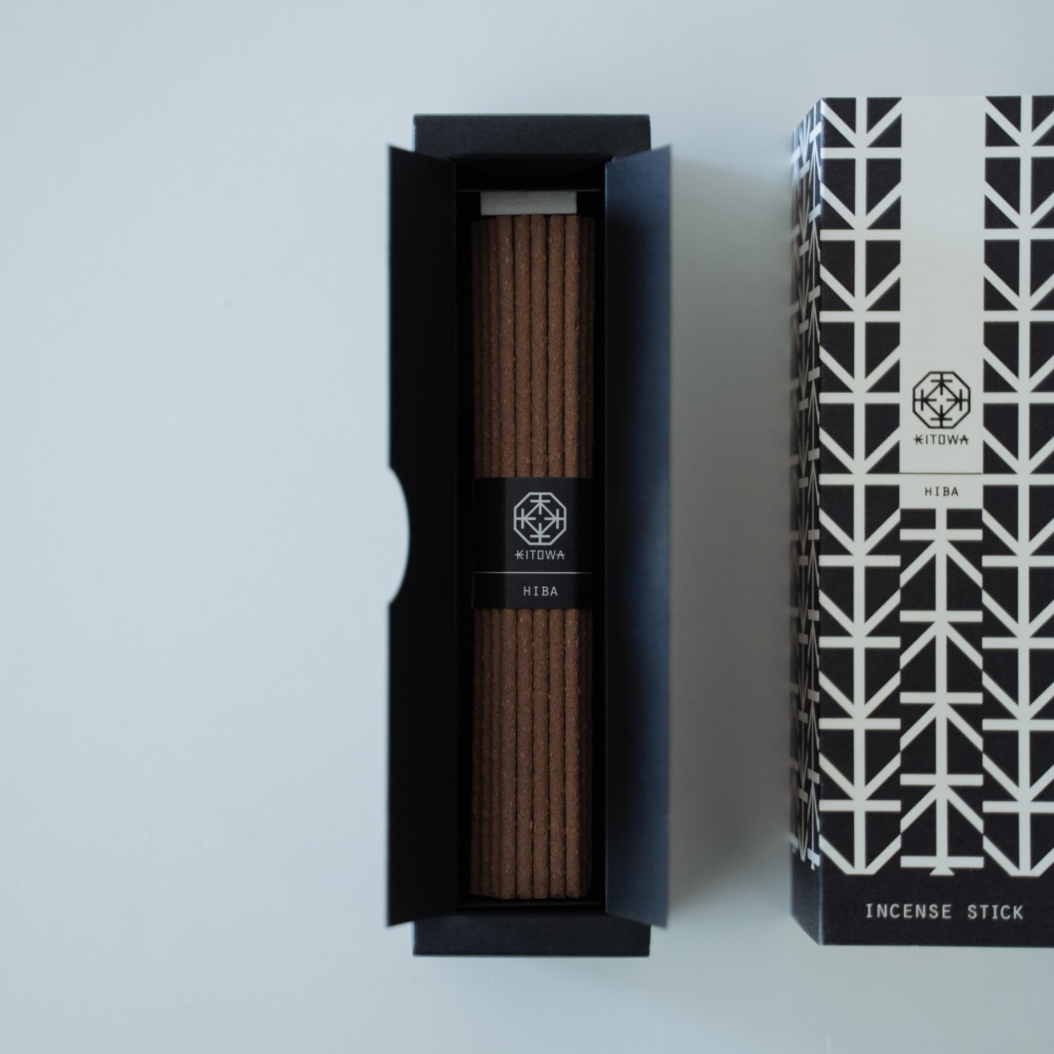 A package of fragrant Hiba wood incense sticks in a minimalist design.