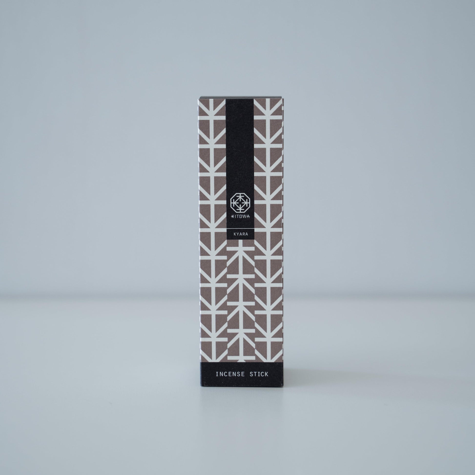 A package of fragrant kyara wood incense sticks in a minimalist design.