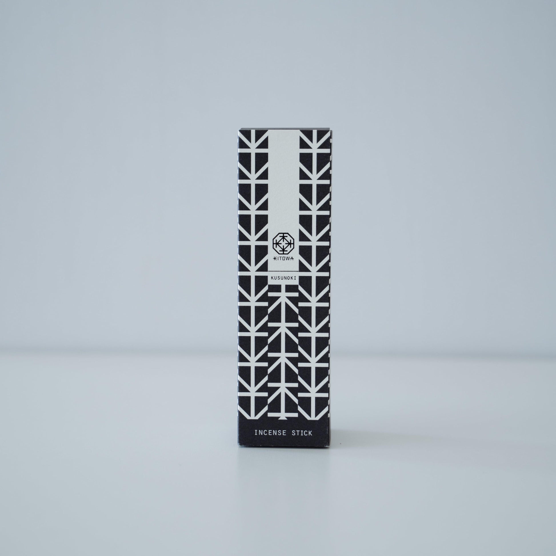 A package of fragrant Kusunoki wood incense sticks in a minimalist design.