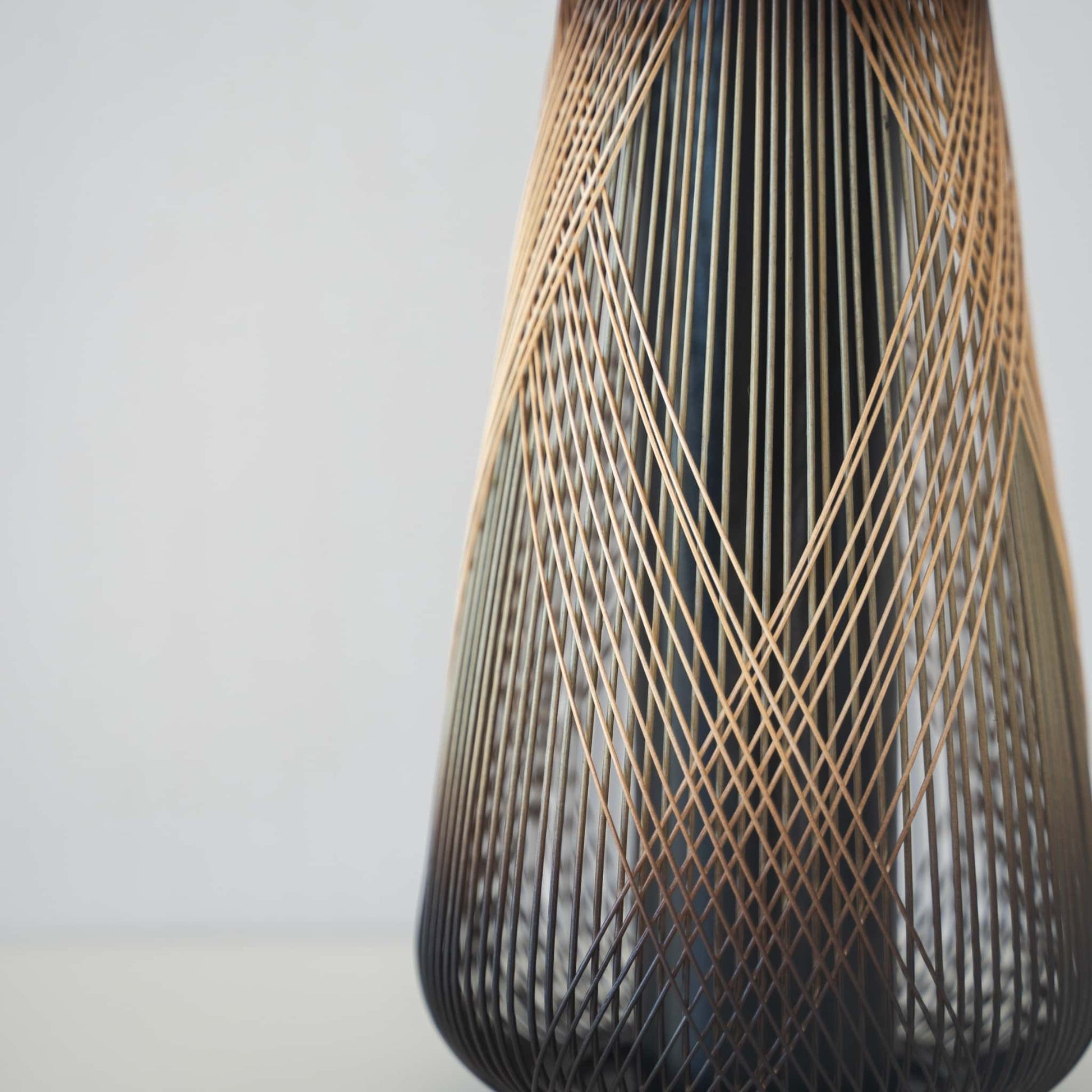 Detail of Japanese bamboo Ikebana vase handcrafted with traditional Japanese bamboo craft techniques from Shizuoka Japan