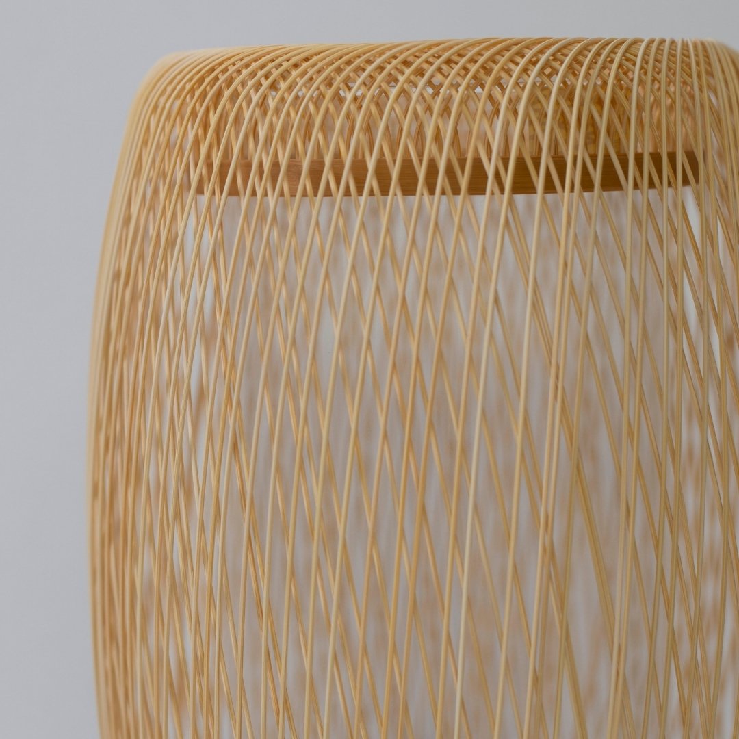 Japanese Bamboo Flower Vase 'Cocoon'—a handcrafted bamboo vase with precisely woven strips by skilled artisans