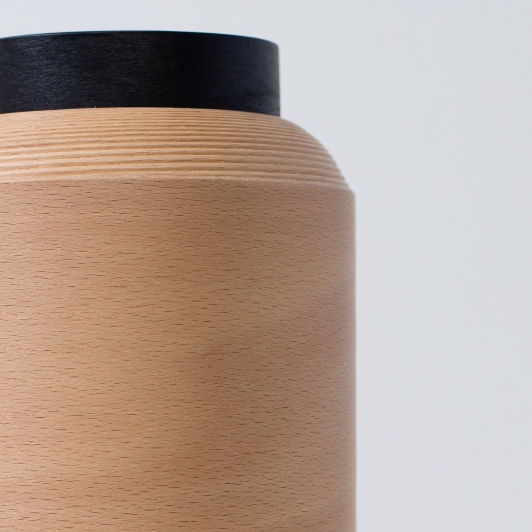 Close-up of wood light lamp with fine beech grain, crafted in Japan using BUNACO technique.