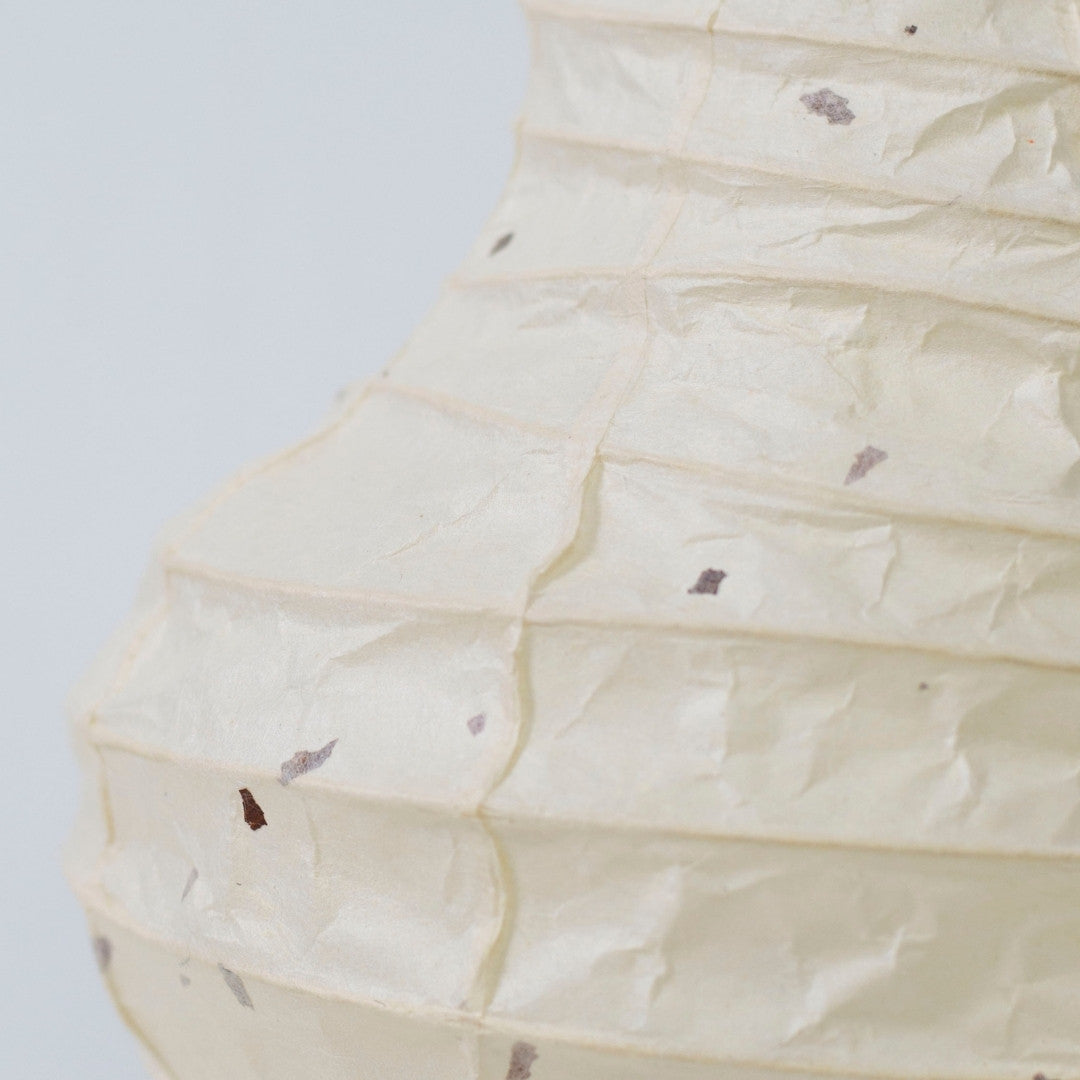Japanese Paper Floor Lamp “BEANS LIGHT” Small – A handcrafted washi paper living room lamp with a uniquely textured surface