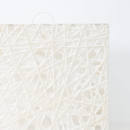 Close-up of white Japanese paper floor lamp ME-LOOK 03, Melook washi web texture detail