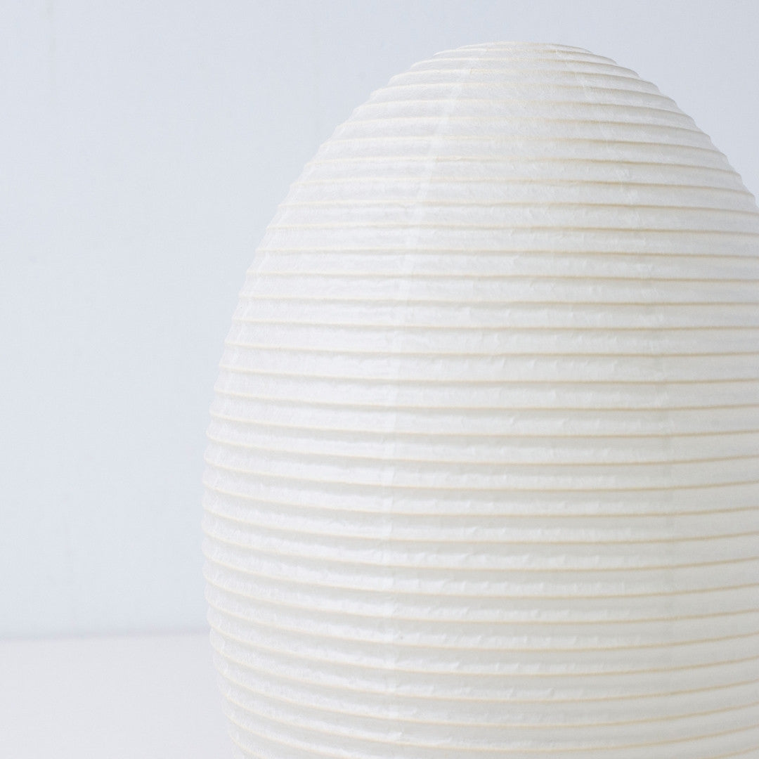 Close-up glowing Japanese paper floor lamp "paper moon 01" – traditional Mino Washi floor lamp