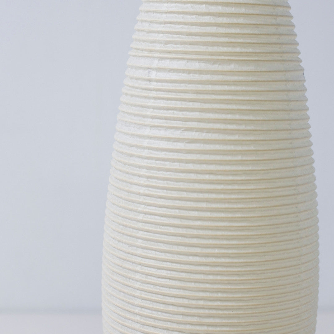 Close-up view of Japanese paper floor lamp "paper moon 03" – vertical Mino Washi Japanese lamp