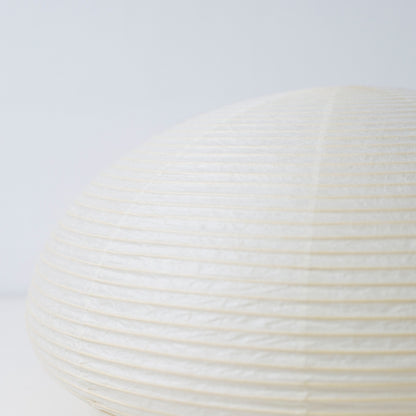 Close-up view of Japanese paper floor lamp "paper moon 04" – horizontal handcrafted Washi lamp