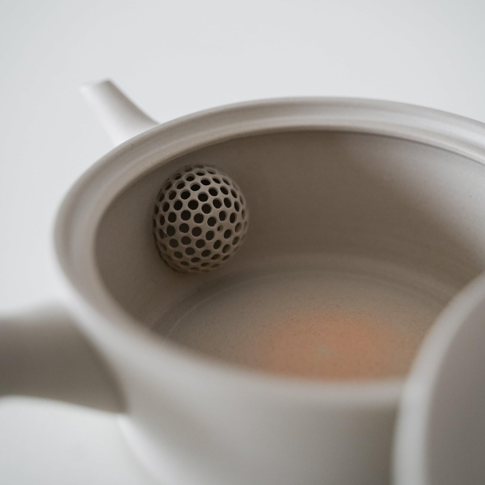 Inside of a simple and beautiful white Japanese teapot